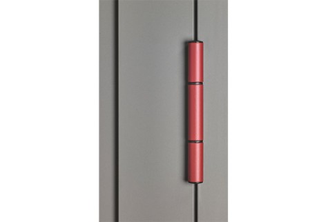 Le Corbusier voordeur - detailweergave van roldeurscharnier in rood